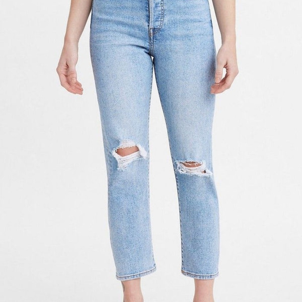 Women's Light Blue Distressed Jeans